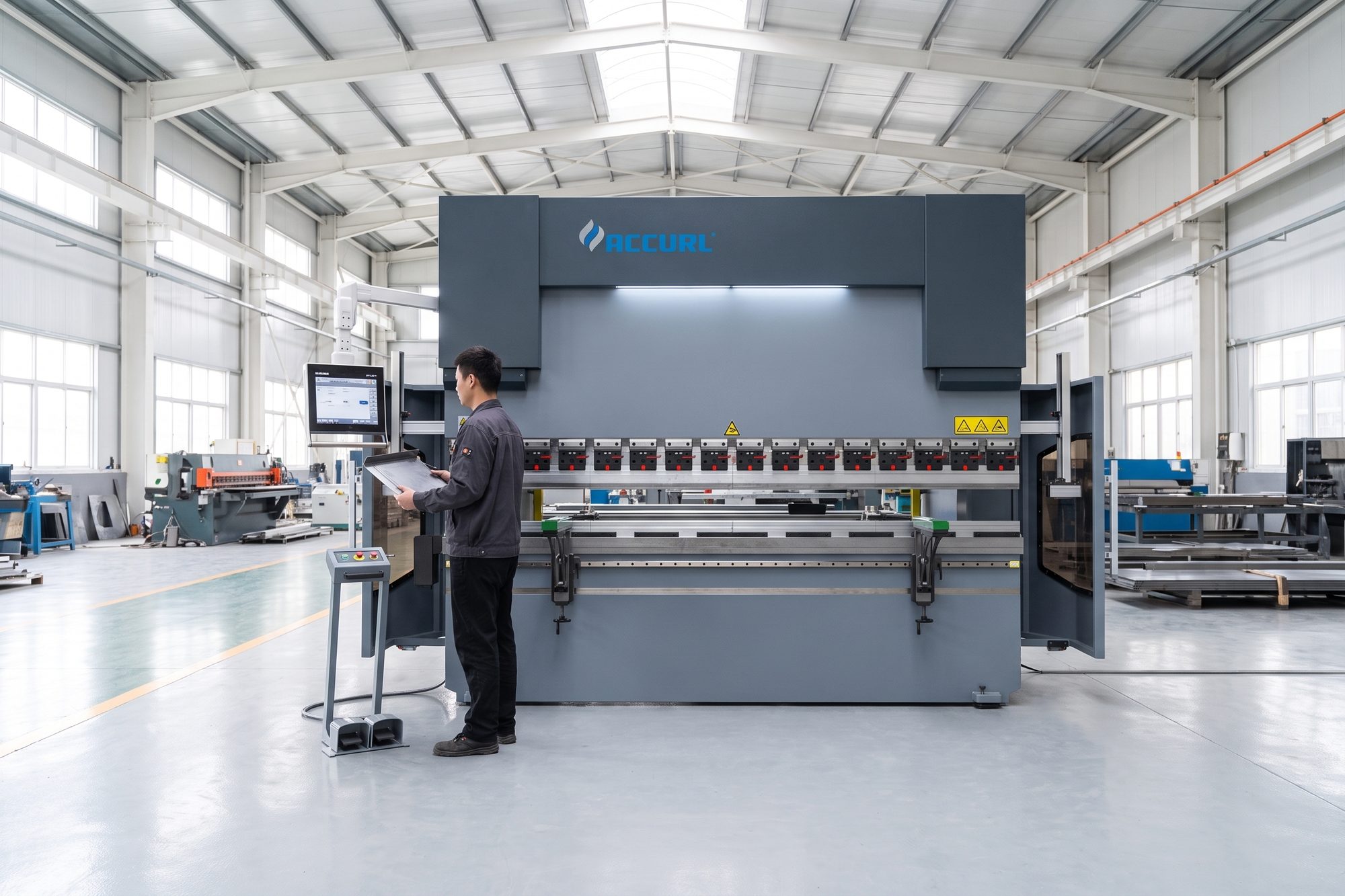 An operator at the control of a EURO PRO press brake